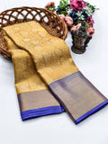 oney gold Kanjivaram silk saree featuring a vibrant royal purple jacquard border.