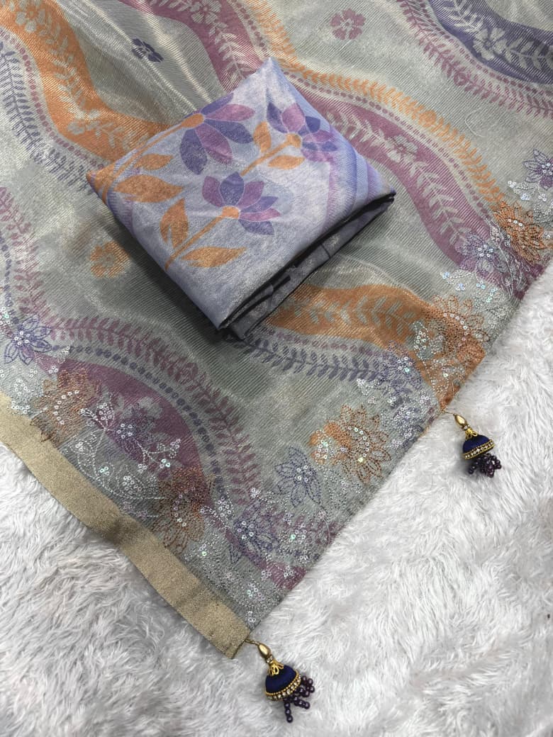Stylish grey linen silk saree featuring artistic floral motifs and luxury border