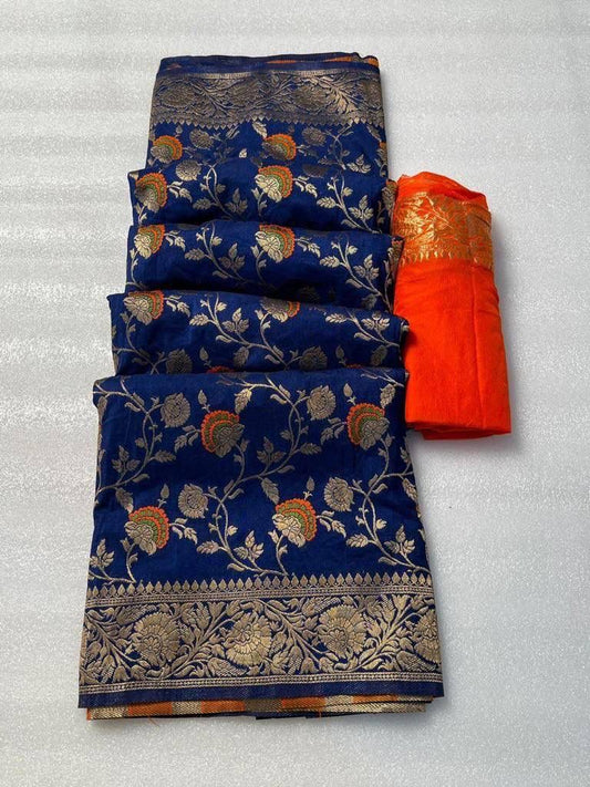 Royal blue pure georgette silk saree laid flat next to a folded bright orange woven blouse piece