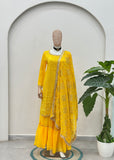 Elegant yellow ethnic kurta set with flowy sharara pants and dupatta