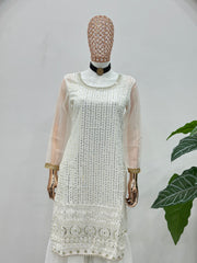 Stylish white party wear sharara suit with detailed embroidery work