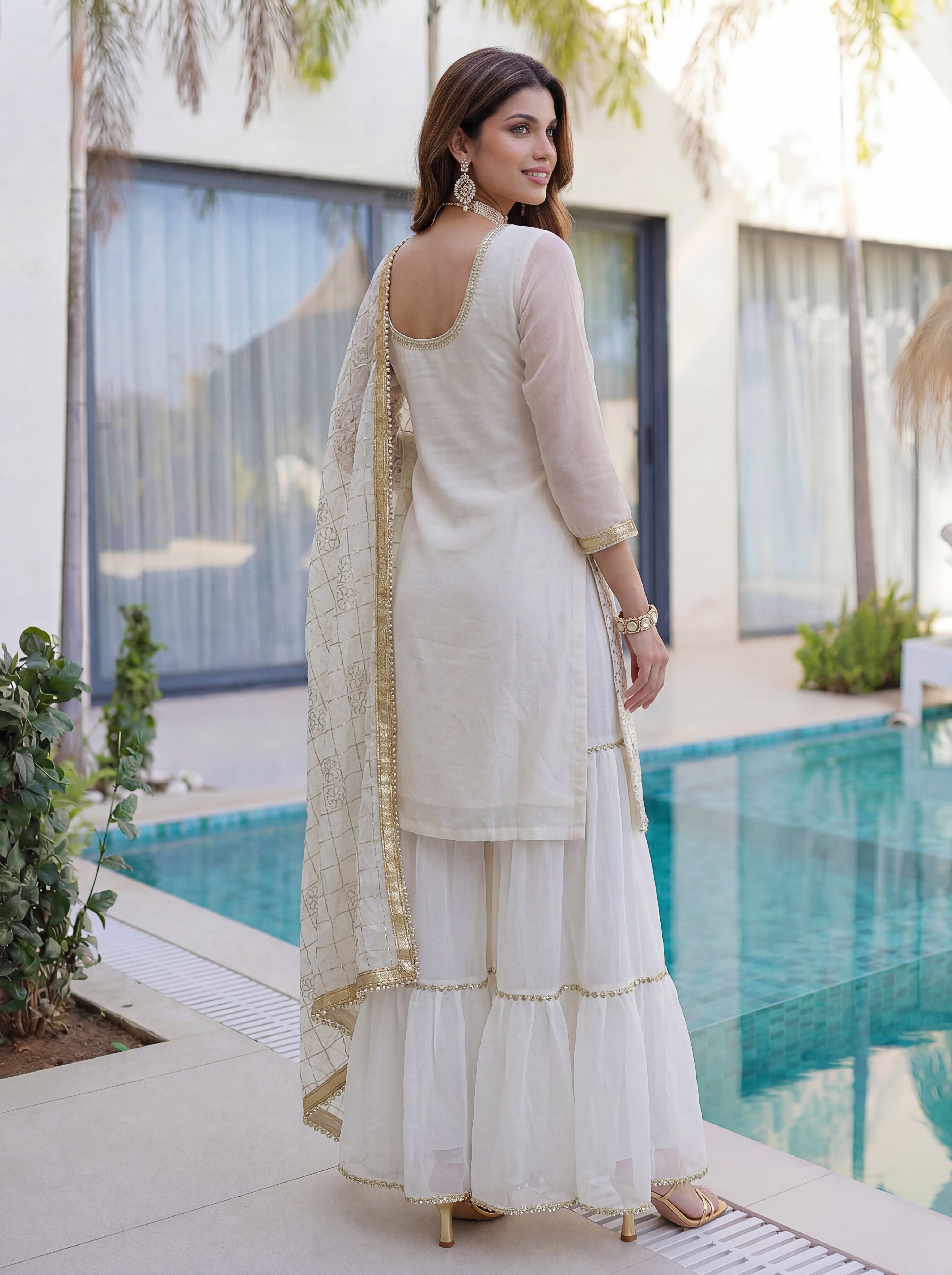 Designer white ethnic outfit with sharara pants and embroidery work