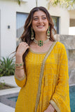 Traditional Indian yellow party wear dress with detailed embroidery work