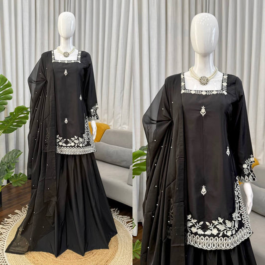 Elegant Black Embroidered Kurta Set with Statement White Detailing & Sheer Dupatta