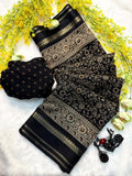 Elegant black traditional saree with golden zari detailing