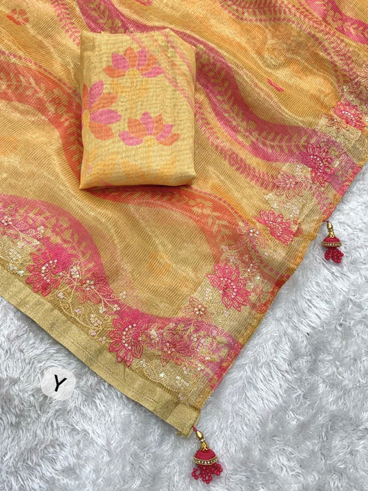 Traditional beige gold saree featuring intricate floral weaving and rich pallu.