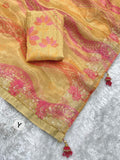 Traditional beige gold saree featuring intricate floral weaving and rich pallu.
