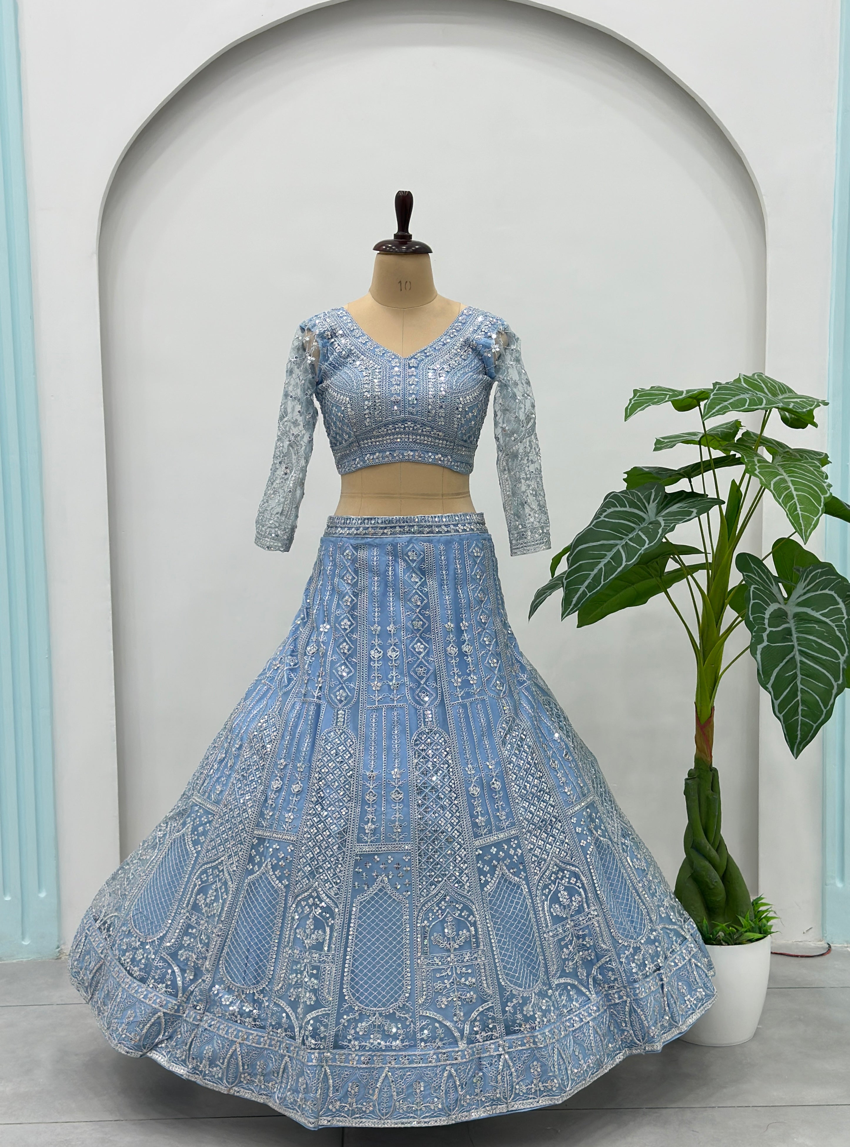 Elegant baby blue wedding lehenga featuring intricate sequins embroidery
