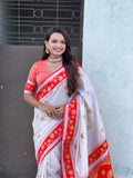 Elegant white silk saree for women featuring pink woven border and authentic Paithani craftsmanship.