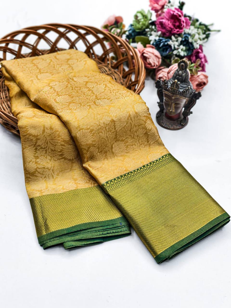 Vintage style ochre gold wedding saree featuring a muted olive green selvedge.