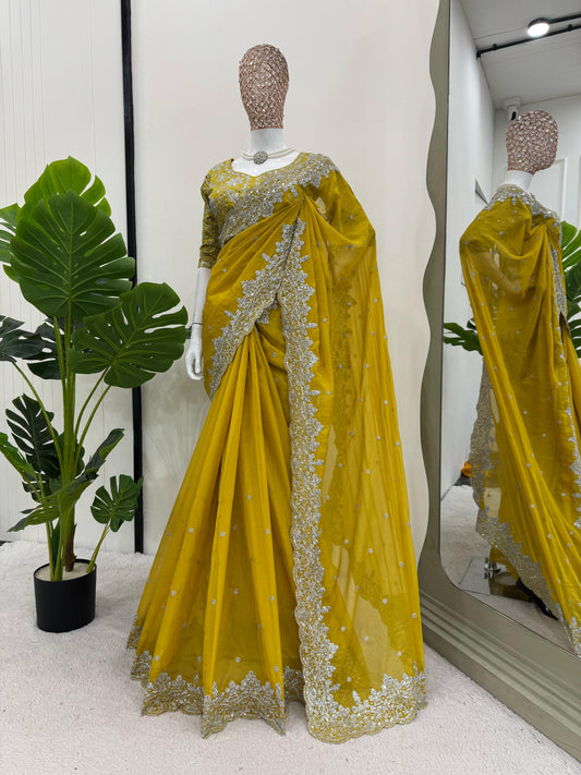 Designer Yellow Net Saree with Intricate Embellishments