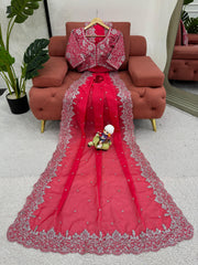 Radiant Rani Pink Saree with Elegant Silver Detailing