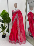 Radiant Rani Pink Saree with Elegant Silver Detailing