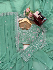 Sage Green Luxe Saree with Floral Detailing