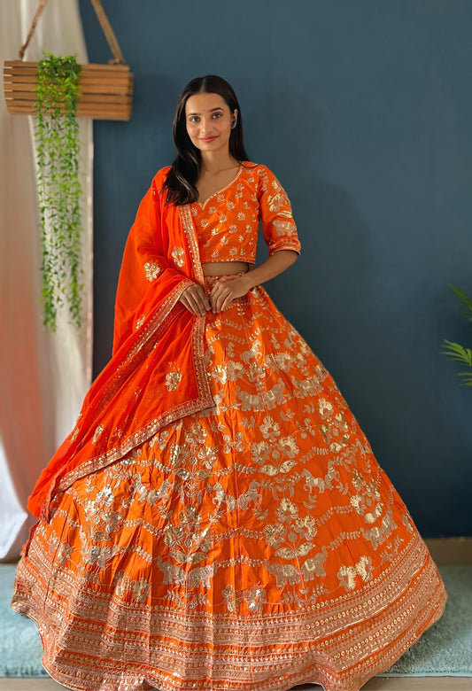 Royal Orange Bridal Lehenga Choli with Heavy Golden Embroidery