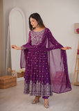 Woman wearing royal purple embroidered Anarkali suit with matching dupatta