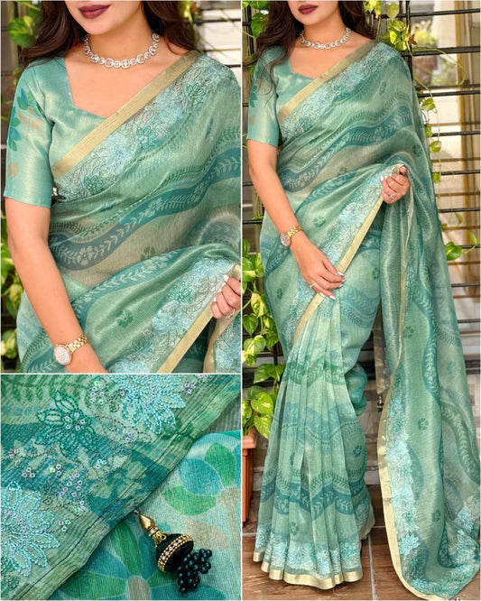 Sea green woven saree for weddings, festivals, and special celebrations.