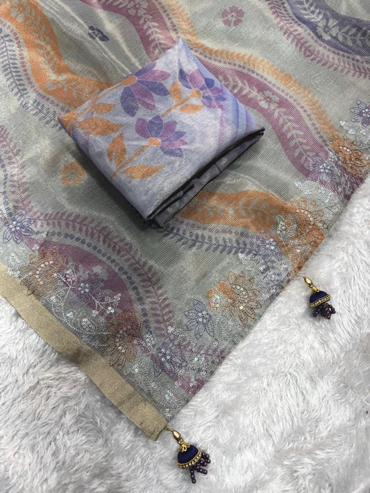 Stylish grey linen silk saree featuring artistic floral motifs and luxury border