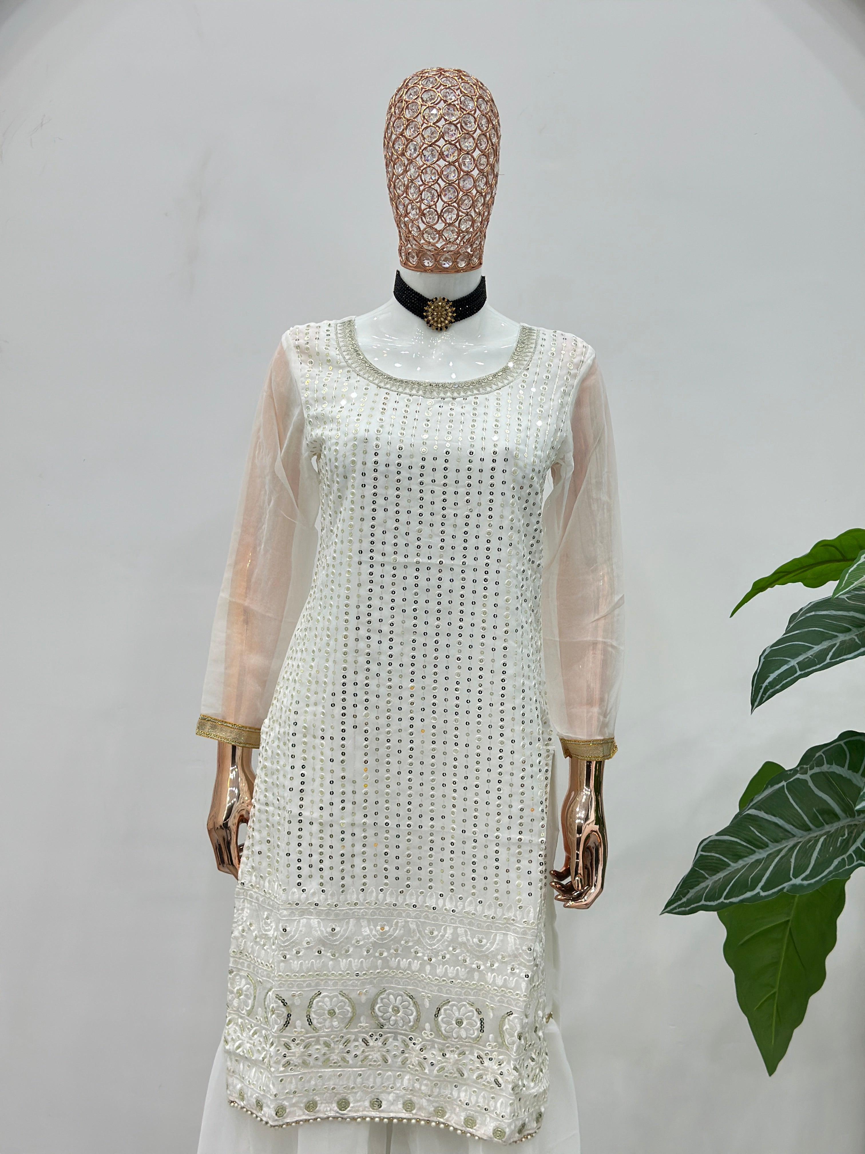 Stylish white party wear sharara suit with detailed embroidery work