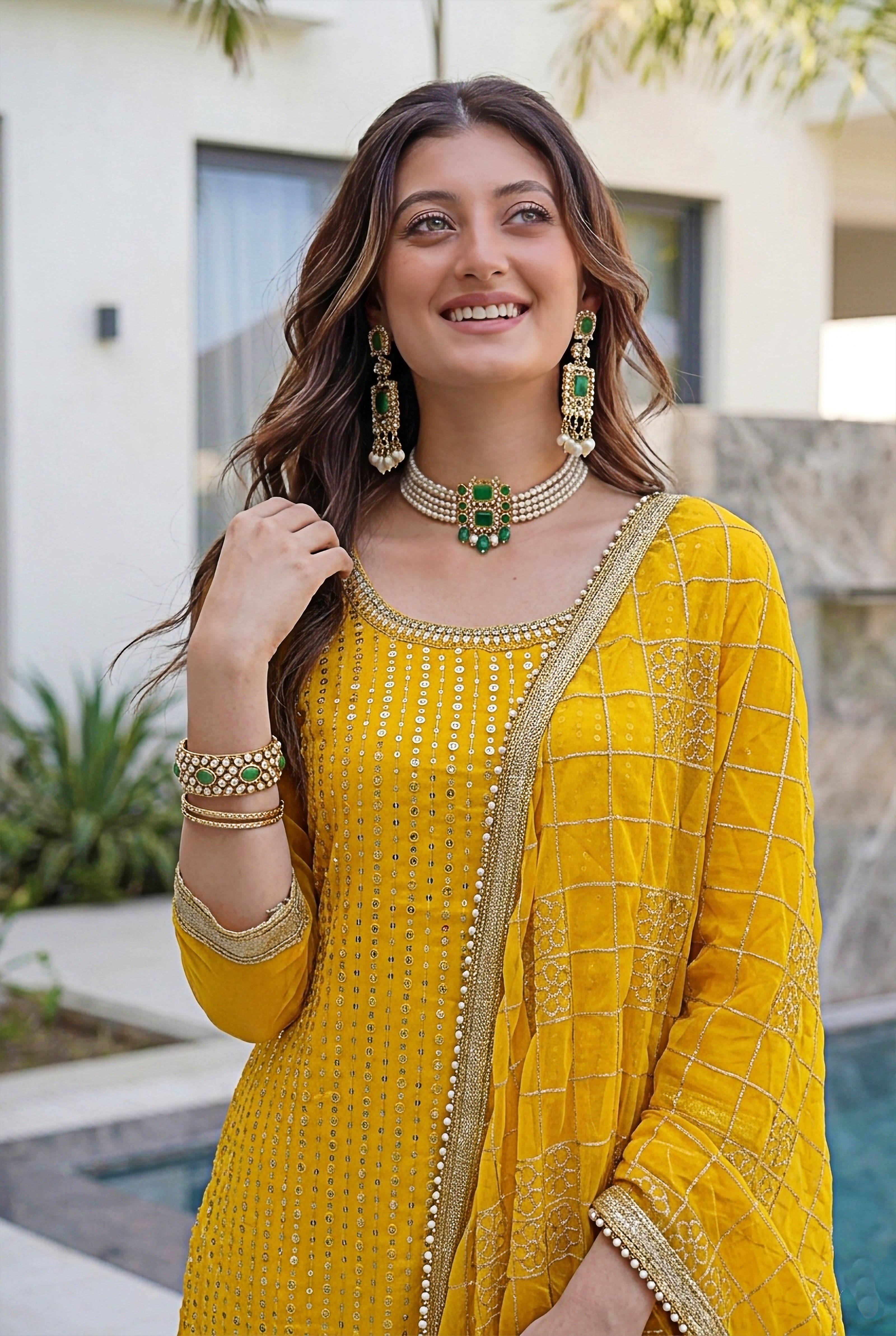 Traditional Indian yellow party wear dress with detailed embroidery work
