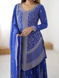 Three-piece party wear royal blue embroidered salwar kameez set featuring flared sharara pants